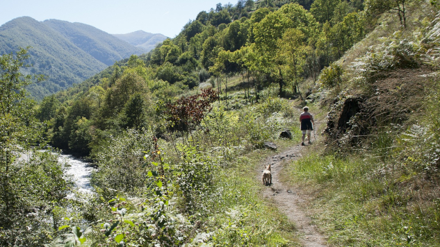 Build Your Road to Success with Change man hiking up mountain path